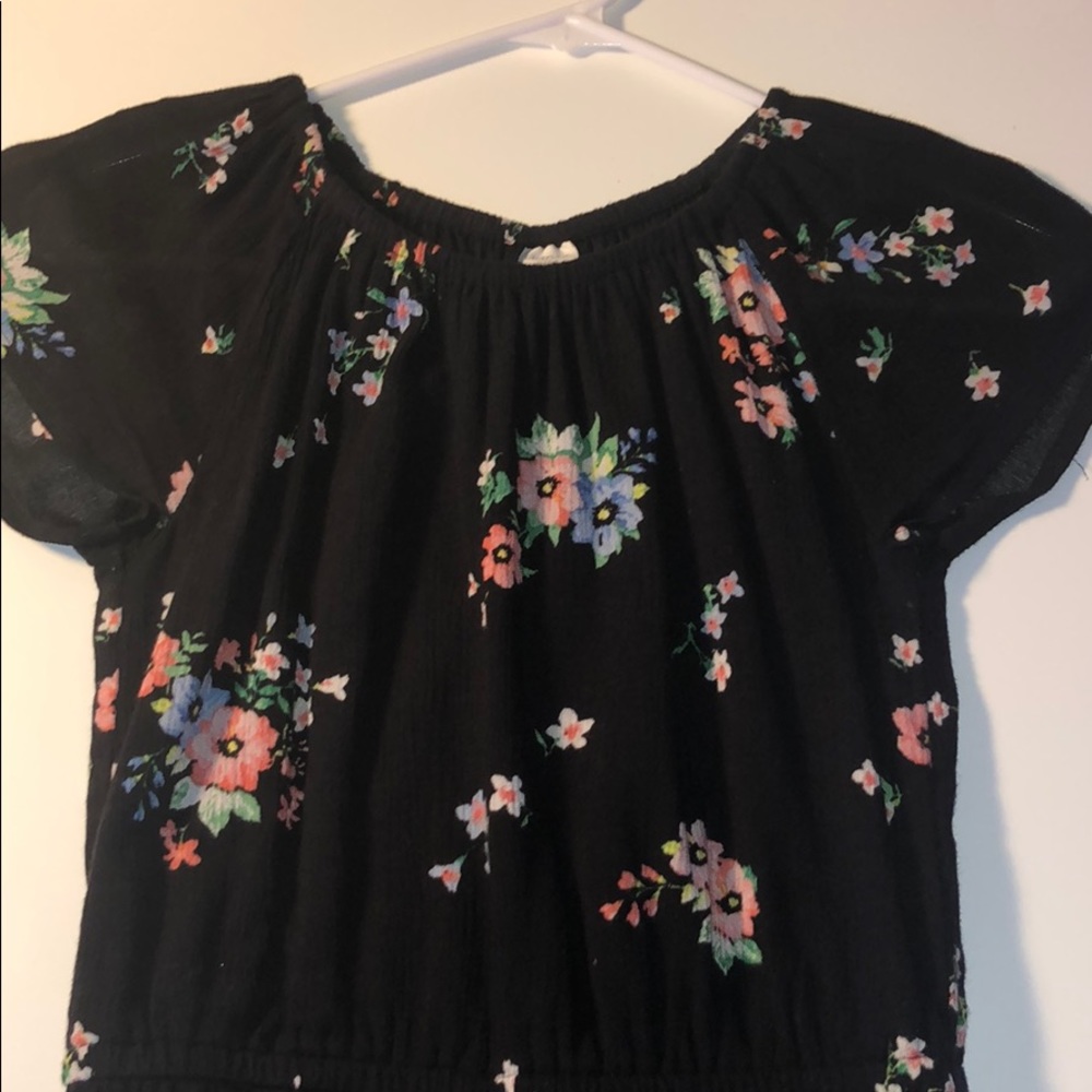 black body suit with flower details